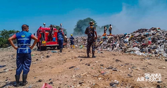 SLAF FIREFIGHTERS ASSIST IN CONTAINING GARBAGE DUMP FIRE IN PUTTALAM