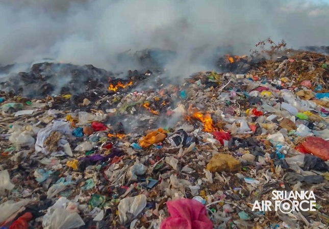 SLAF FIREFIGHTERS ASSIST IN CONTAINING GARBAGE DUMP FIRE IN PUTTALAM