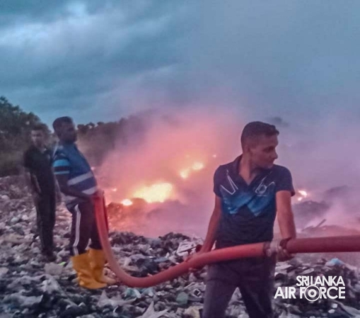 SLAF FIREFIGHTERS ASSIST IN CONTAINING GARBAGE DUMP FIRE IN PUTTALAM