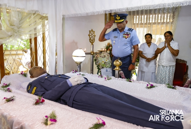 AIR CHIEF PAYS LAST RESPECTS TO FALLEN SERVICEMEN