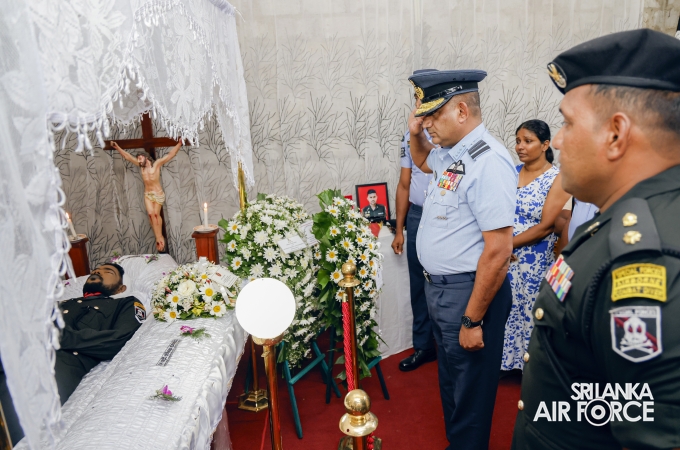 AIR CHIEF PAYS LAST RESPECTS TO FALLEN SERVICEMEN
