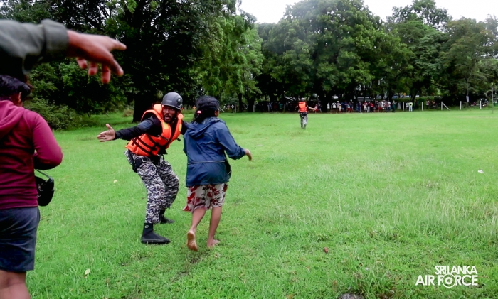 SLAF BELL 212 RESCUES THREE PERSONS STRANDED BY FLOODS IN MAHAWA (ELLA)